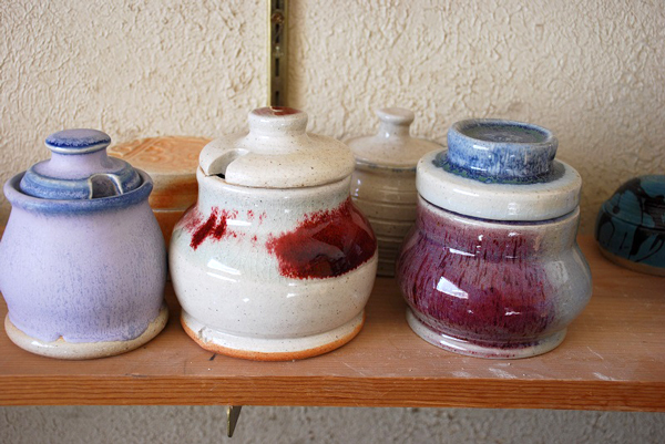 A useful and beautiful wintertime beekeeping project: ceramic honey pots. Pots and photo &copy; Michael Skeels.
