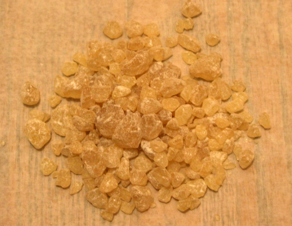 Pine rosin chunks: Pine rosin comes in dust-covered chunks. You can crush them in a mortar and pestle to speed melting — or just be patient.